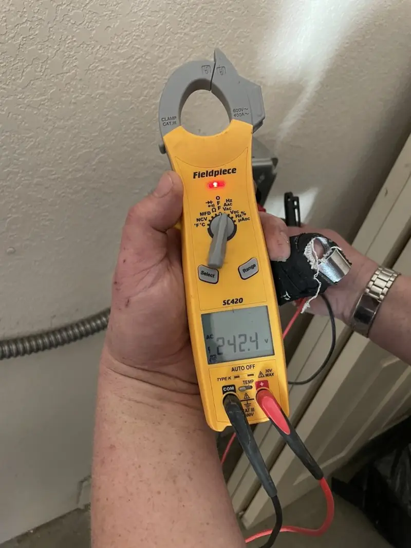 Voltage testing with clamp meter during Circuit Breaker Repair in Anaconda-Deer Lodge County